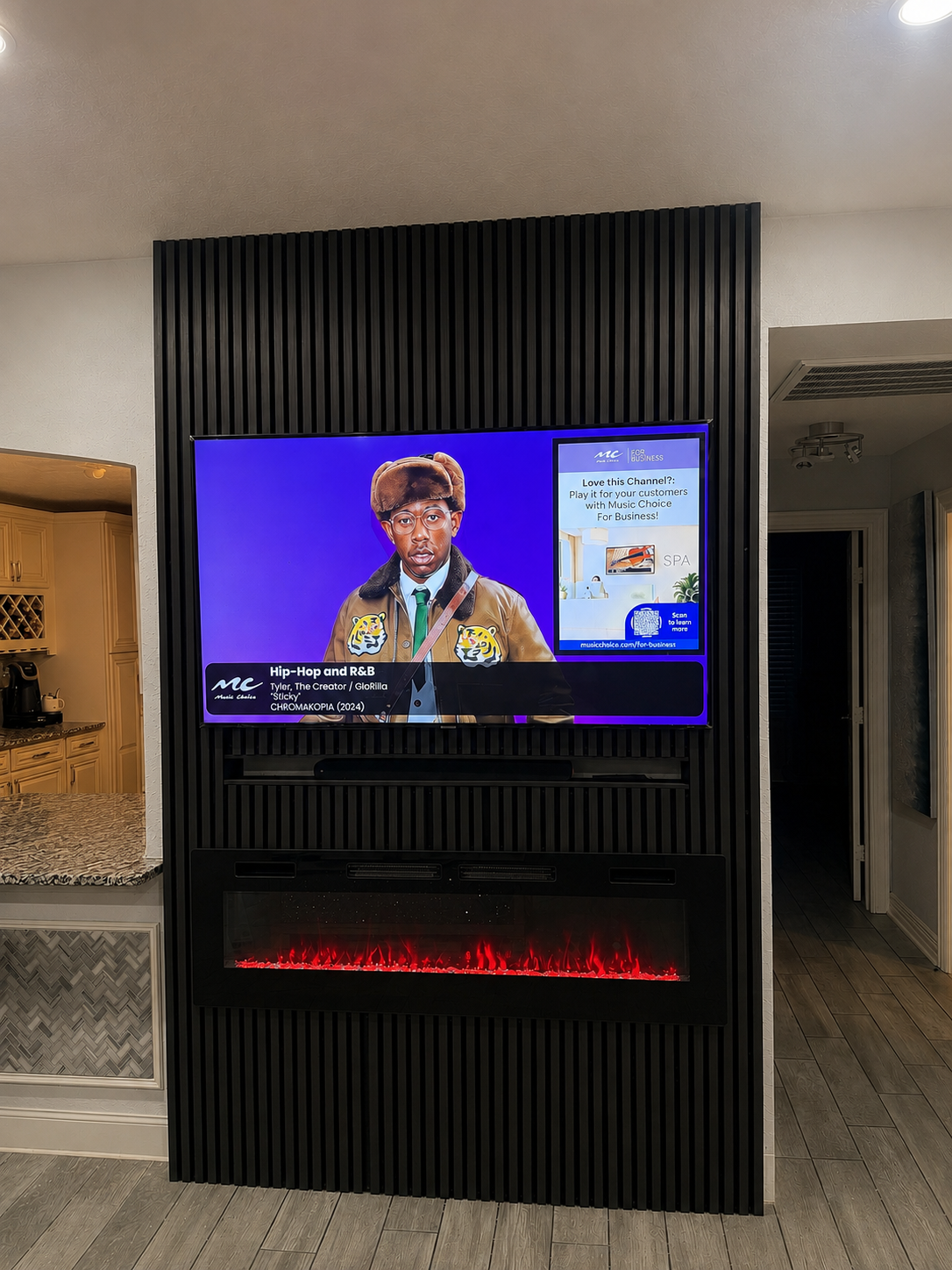 Custom slat-wall TV and fireplace install by Smart Home Installations